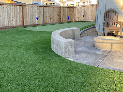 Artificial Turf Putting Green And Patio With Firepit